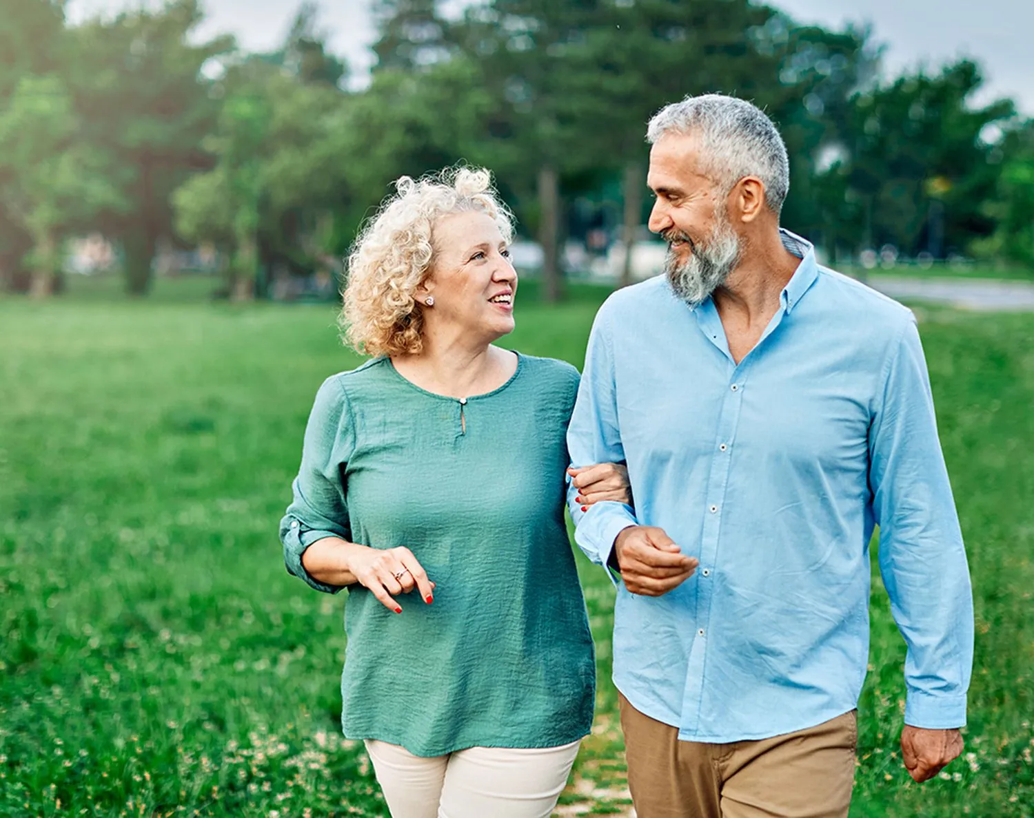 A couple walking together outdoors